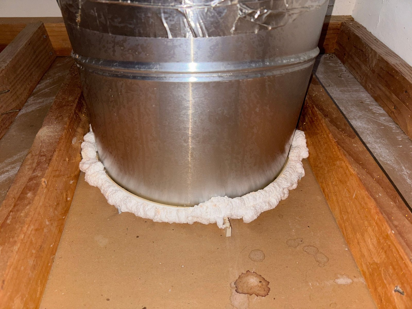 Foam sealing around a duct in a Agoura Hills attic