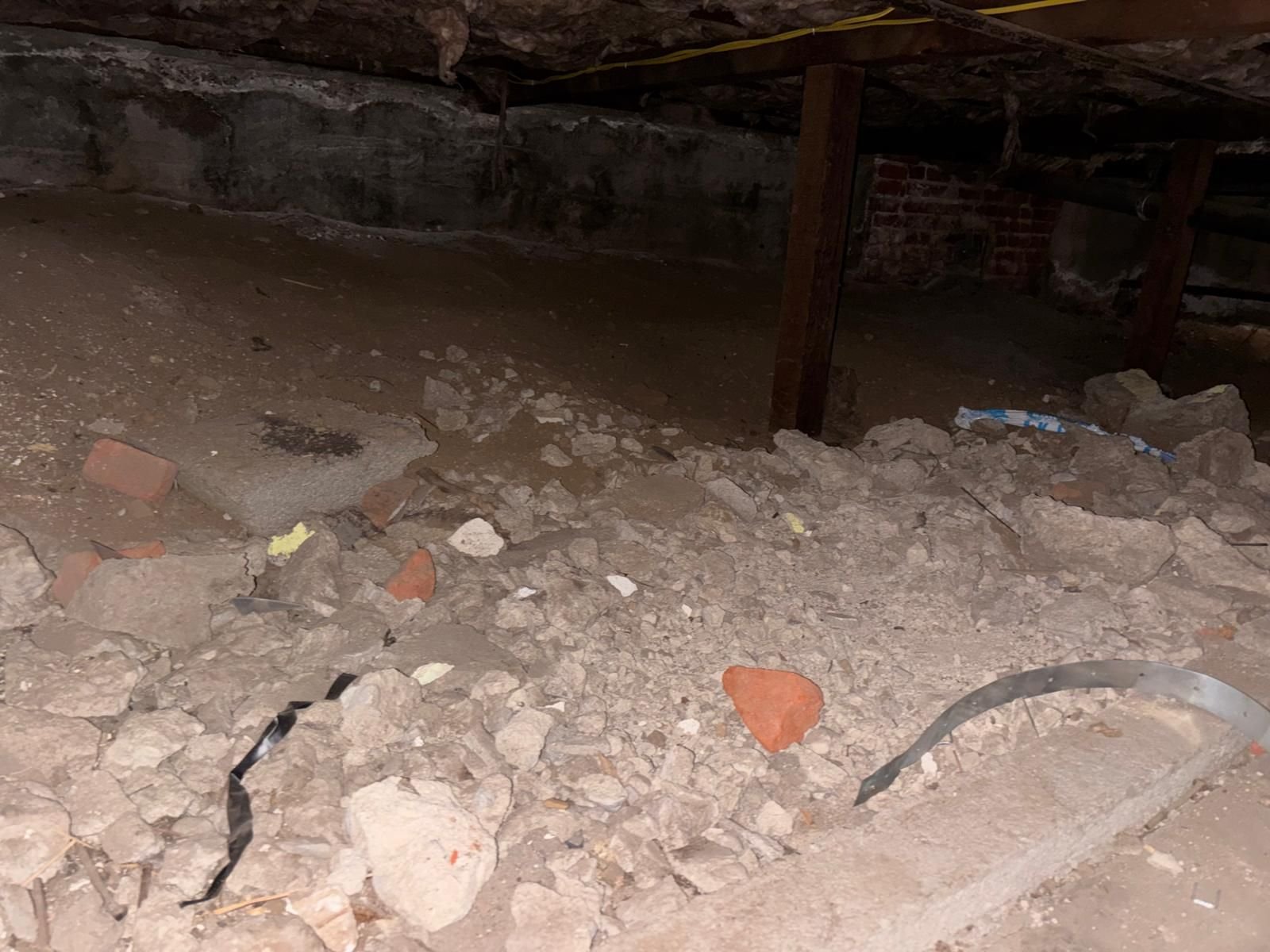 Altadena crawl space before work, bare soil