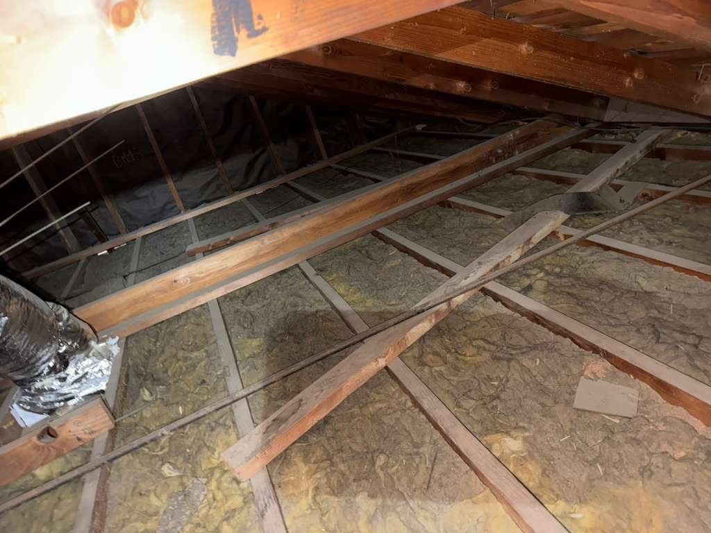Anaheim attic before work, old insulation