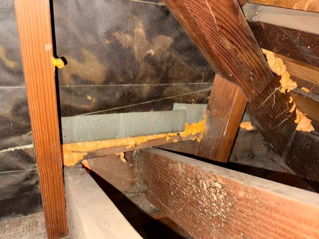 Polyurethane foam air sealing along attic framing in Anaheim