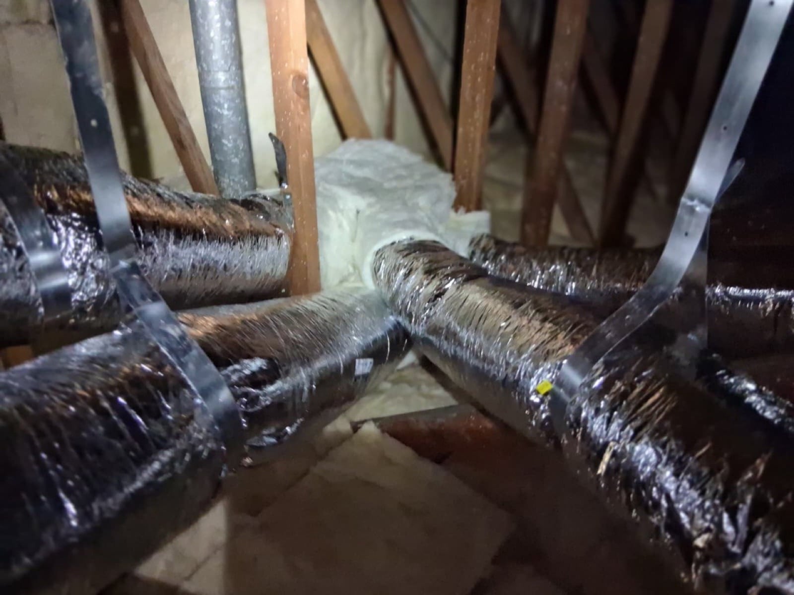 Early stage of the Westminster attic job — clearing out