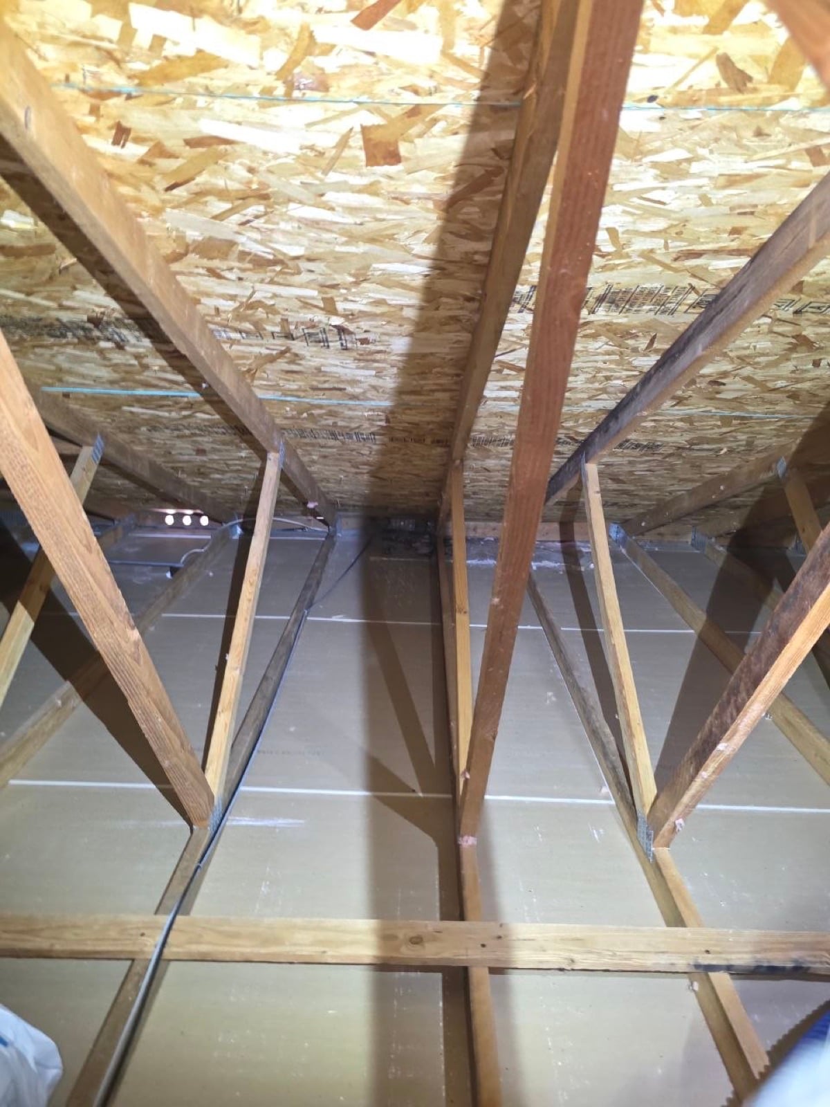 Early stage of the Tracy attic job — clearing out