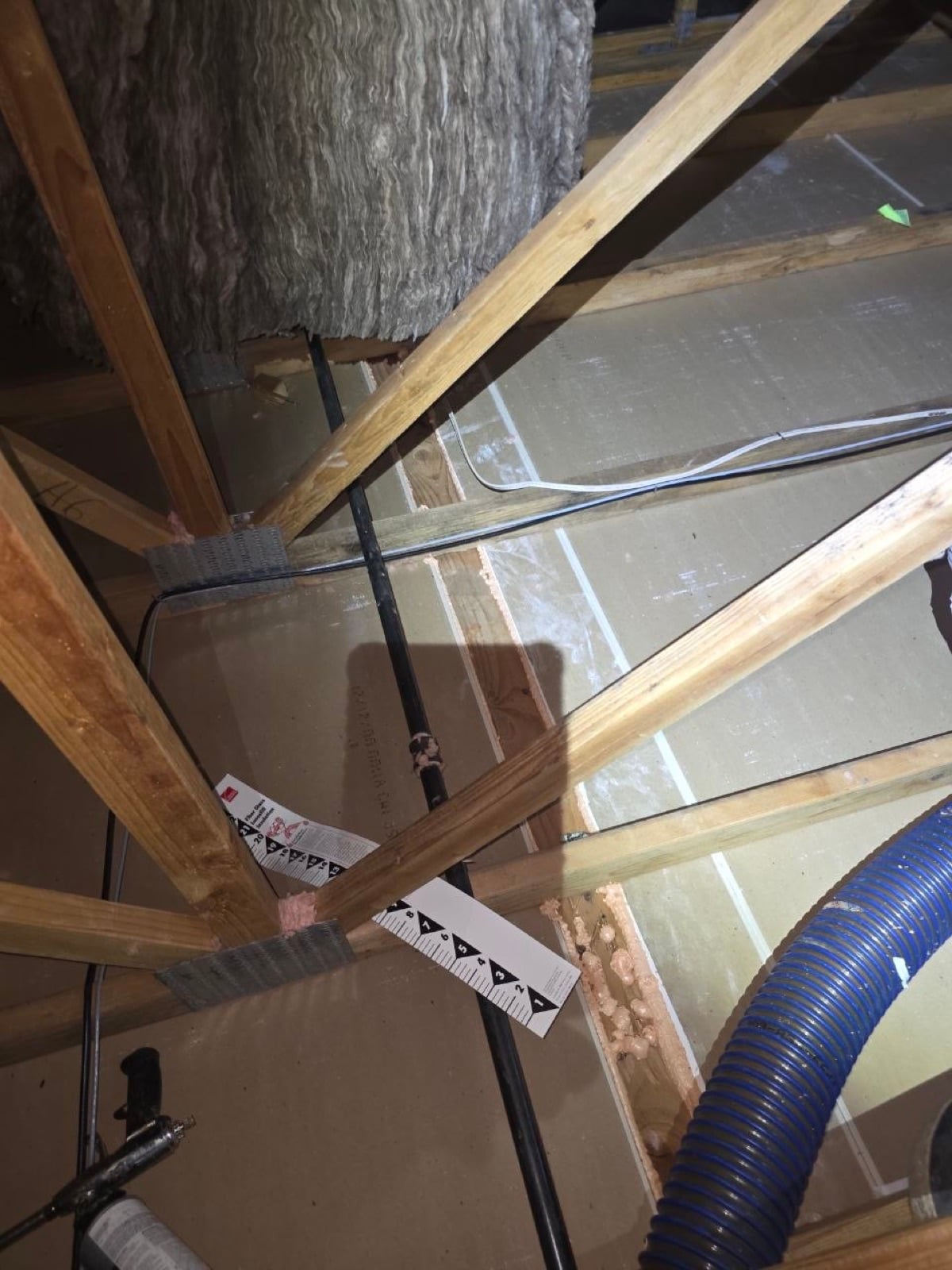 Tracy attic with the removal hose run in and the deck cleared