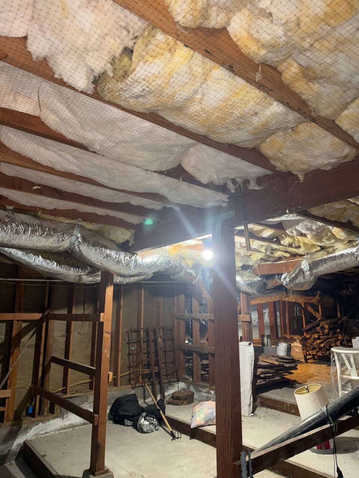 Emerald Hills attic before work began, showing the condition the crew found