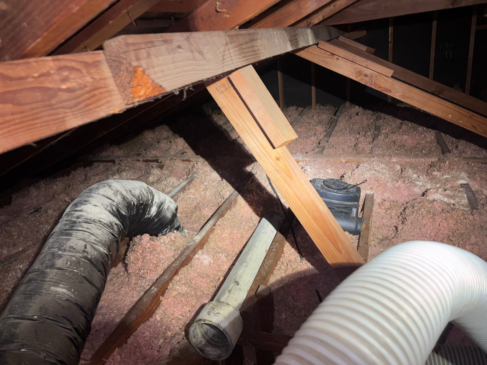 Garden Grove attic before work began, showing the condition the crew found