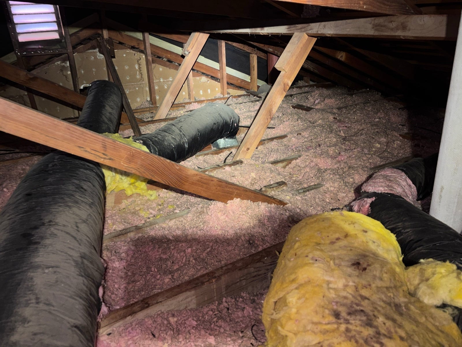 Early stage of the Garden Grove attic job — the cleanup