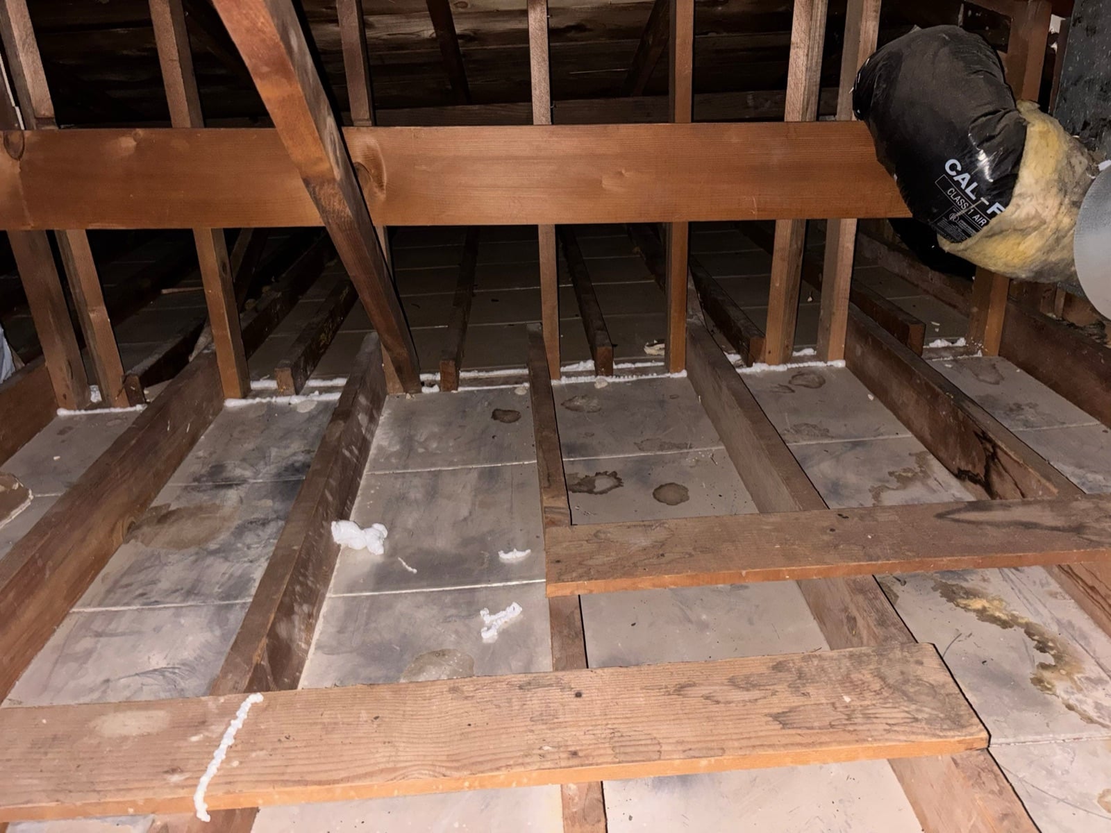Early stage of the Duarte attic job — clearing out