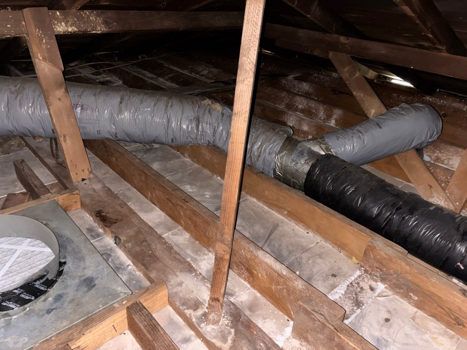 Duarte attic fan boot sealed into the deck with the new ducts alongside
