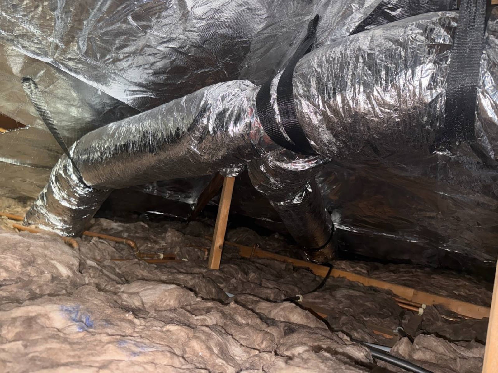 San Jose attic before work began, showing the condition the crew found