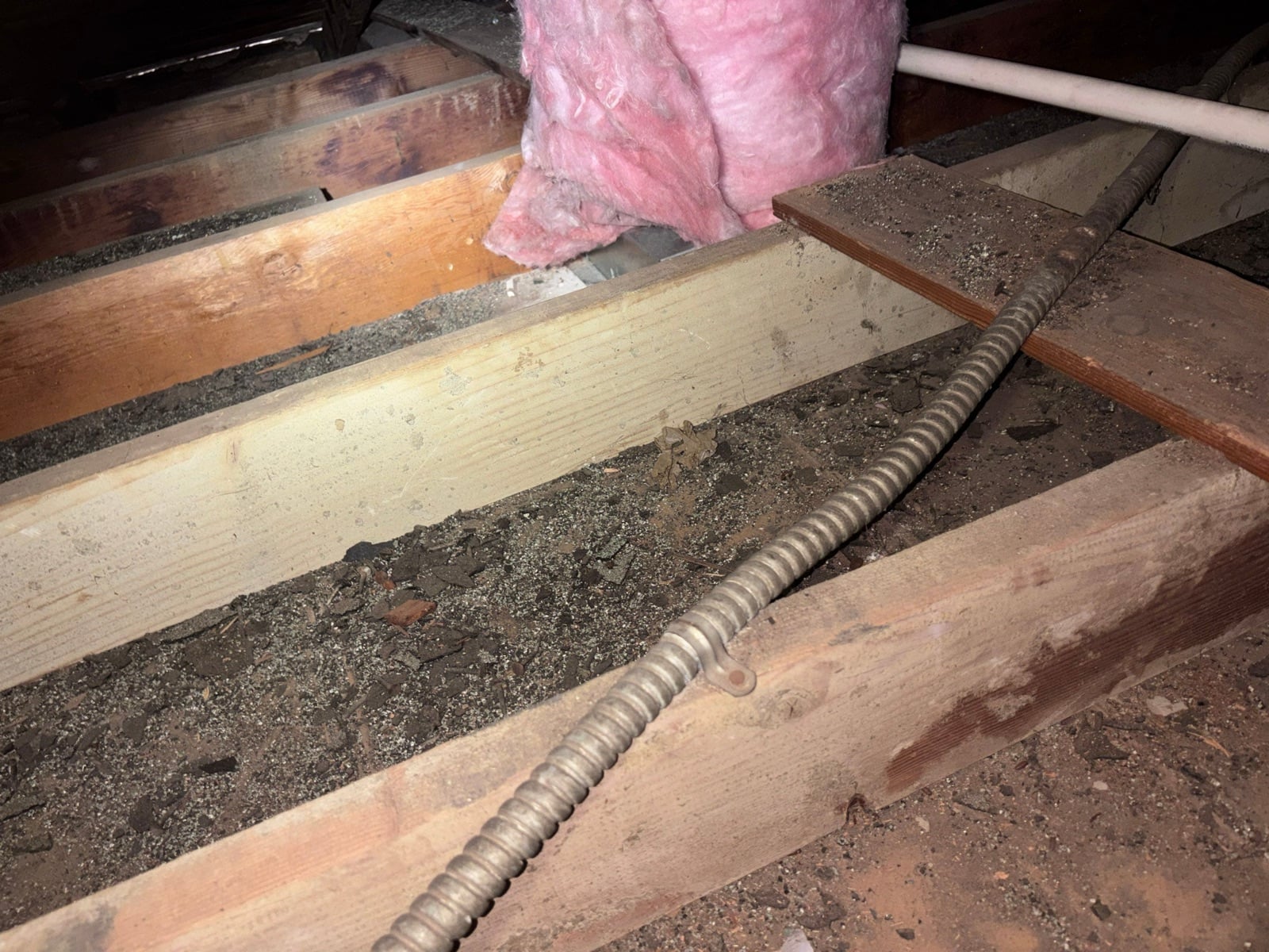 Early stage of the Los Angeles attic job — clearing out