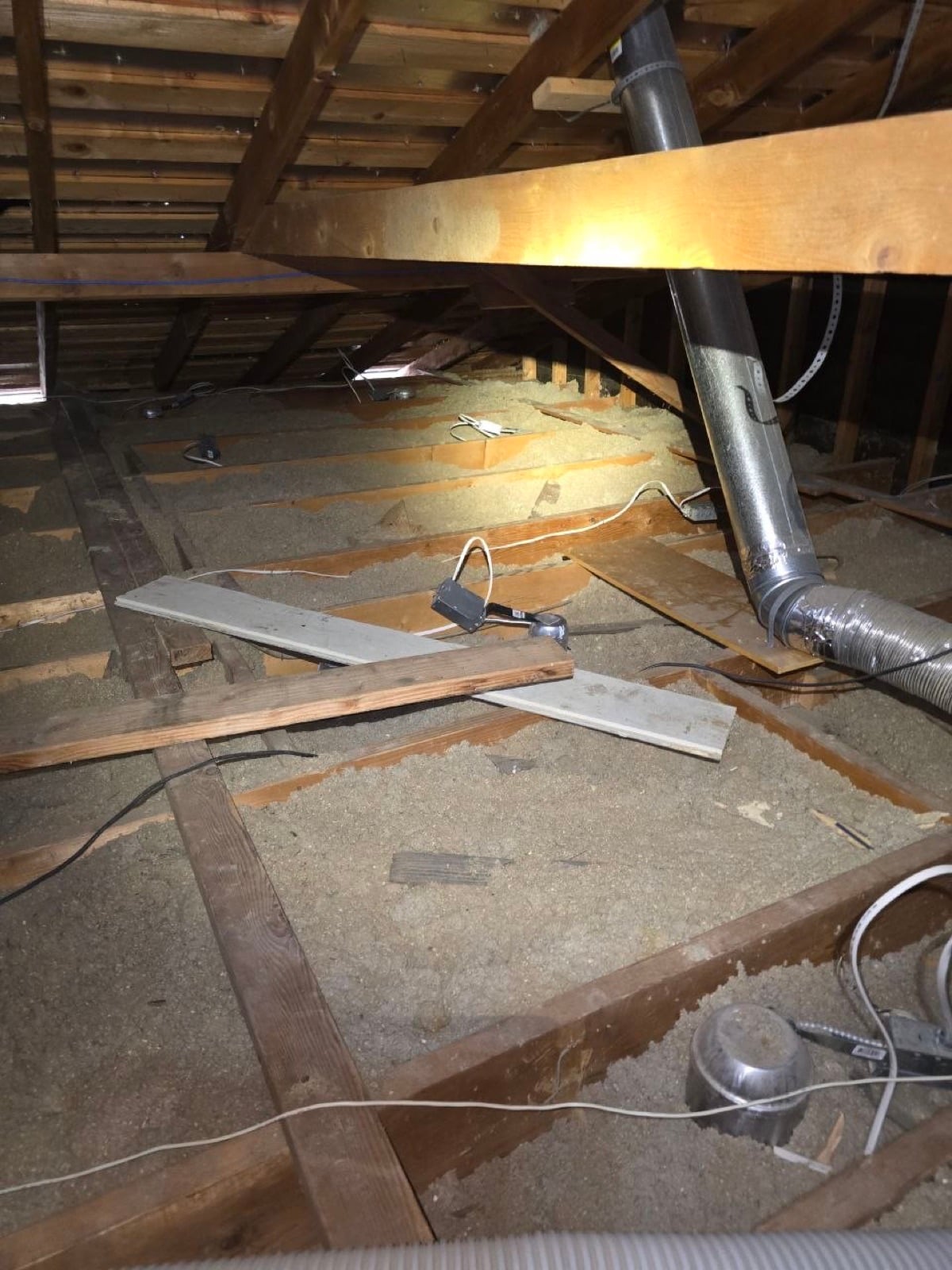 San Jose attic before work began, showing the condition the crew found
