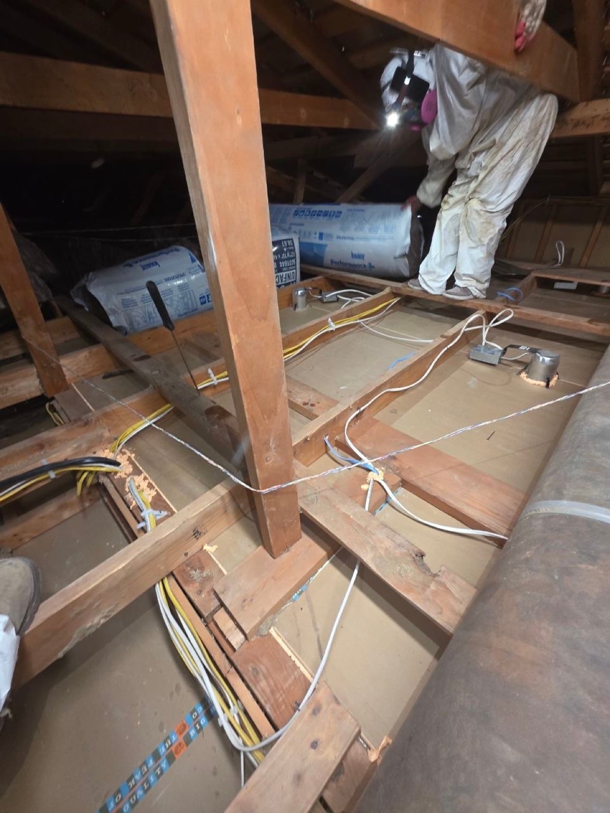 Early stage of the San Jose attic job — clearing out