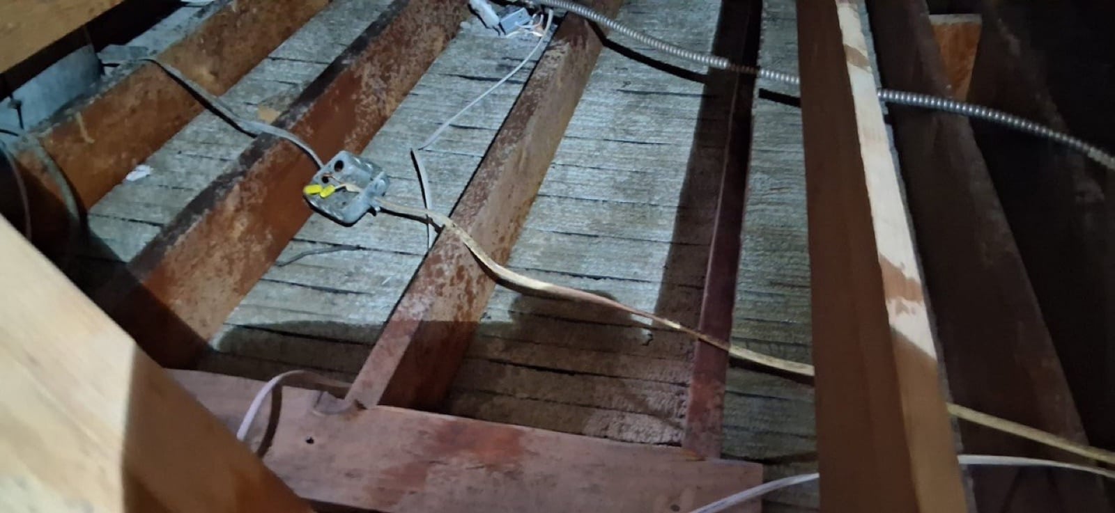 Los Angeles attic before work began, showing the condition the crew found