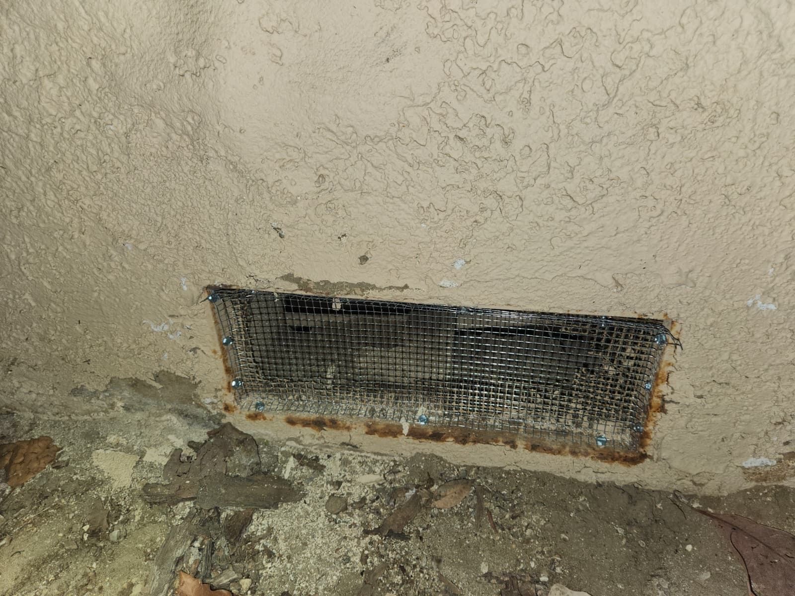 Upland attic and crawl space before work began, showing the condition the crew found