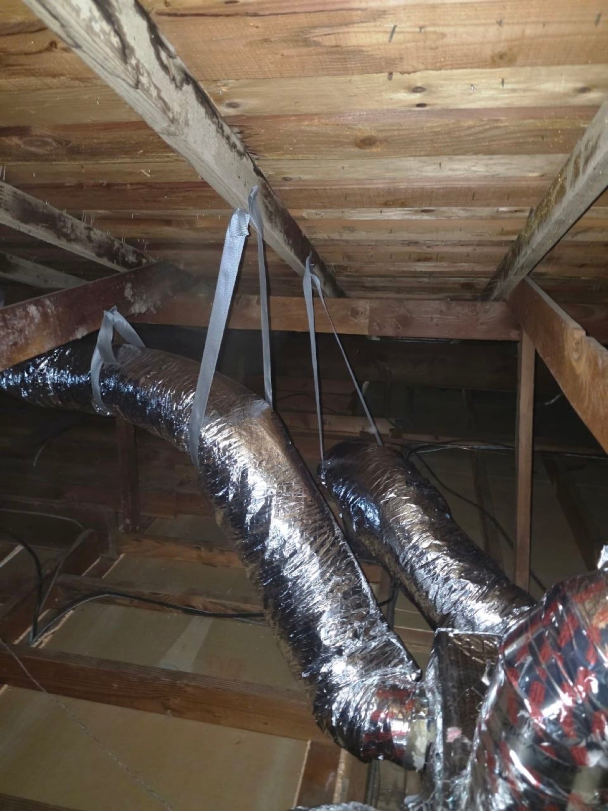 Walnut Creek attic with the new air ducts strapped into place