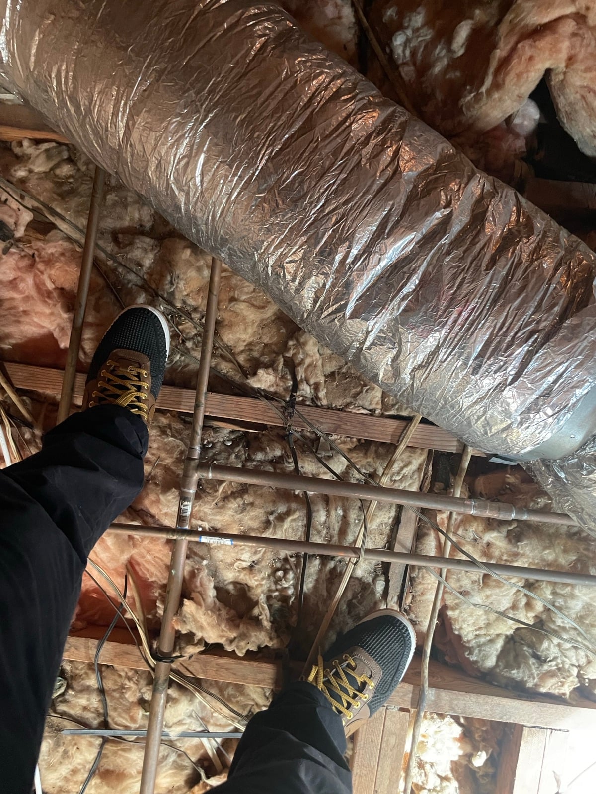 Buena Park attic before work began, showing the condition the crew found