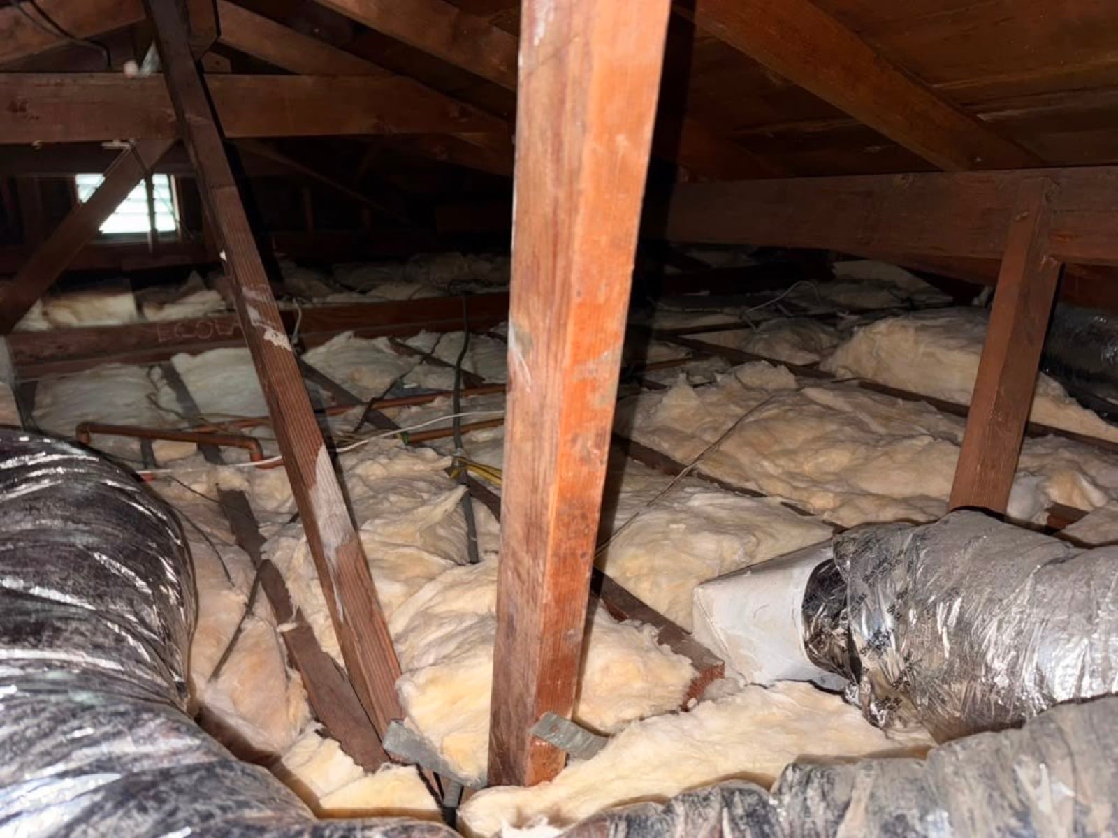Early stage of the Buena Park attic job — clearing out