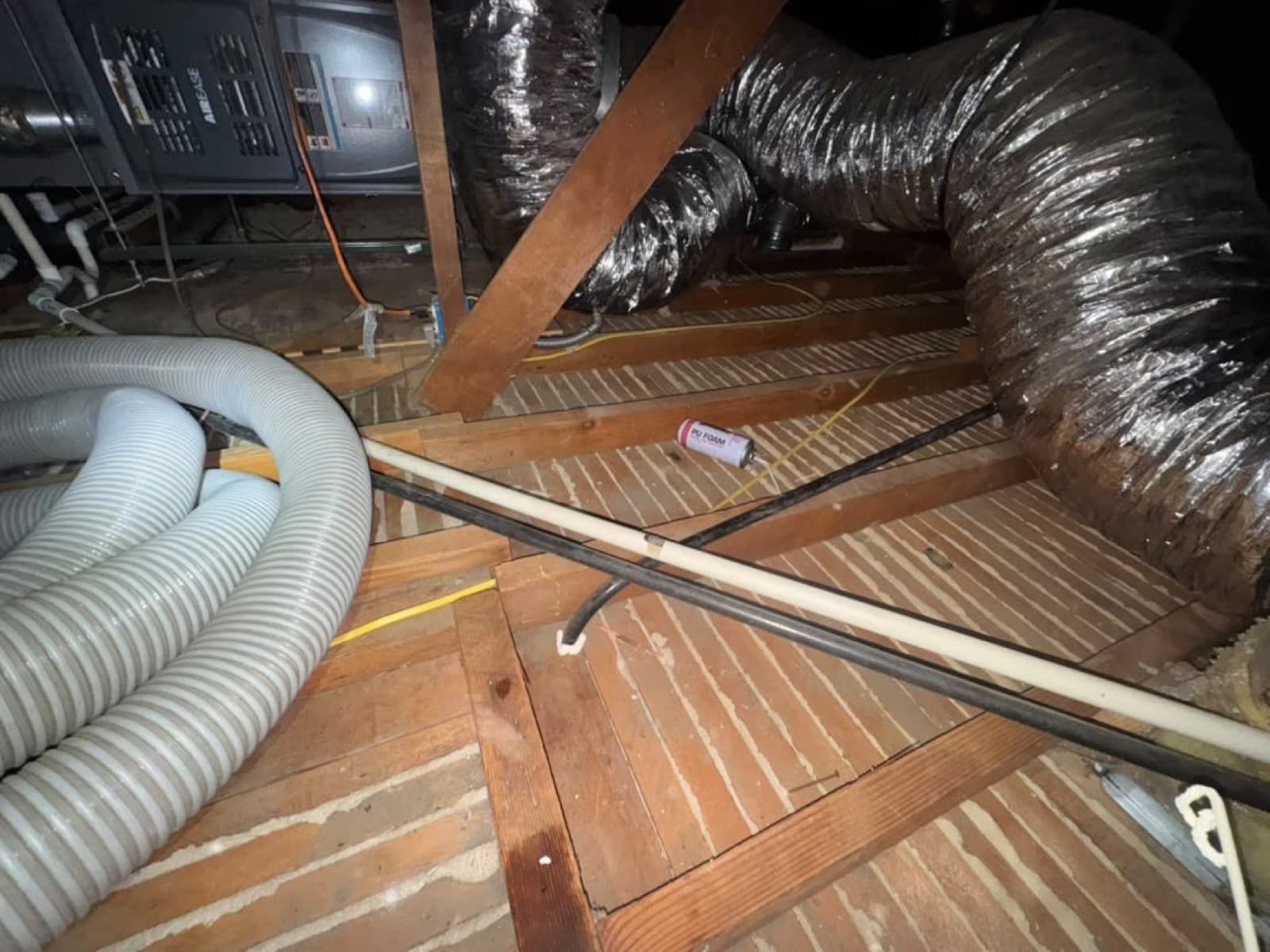 Early stage of the Burbank attic job — clearing out
