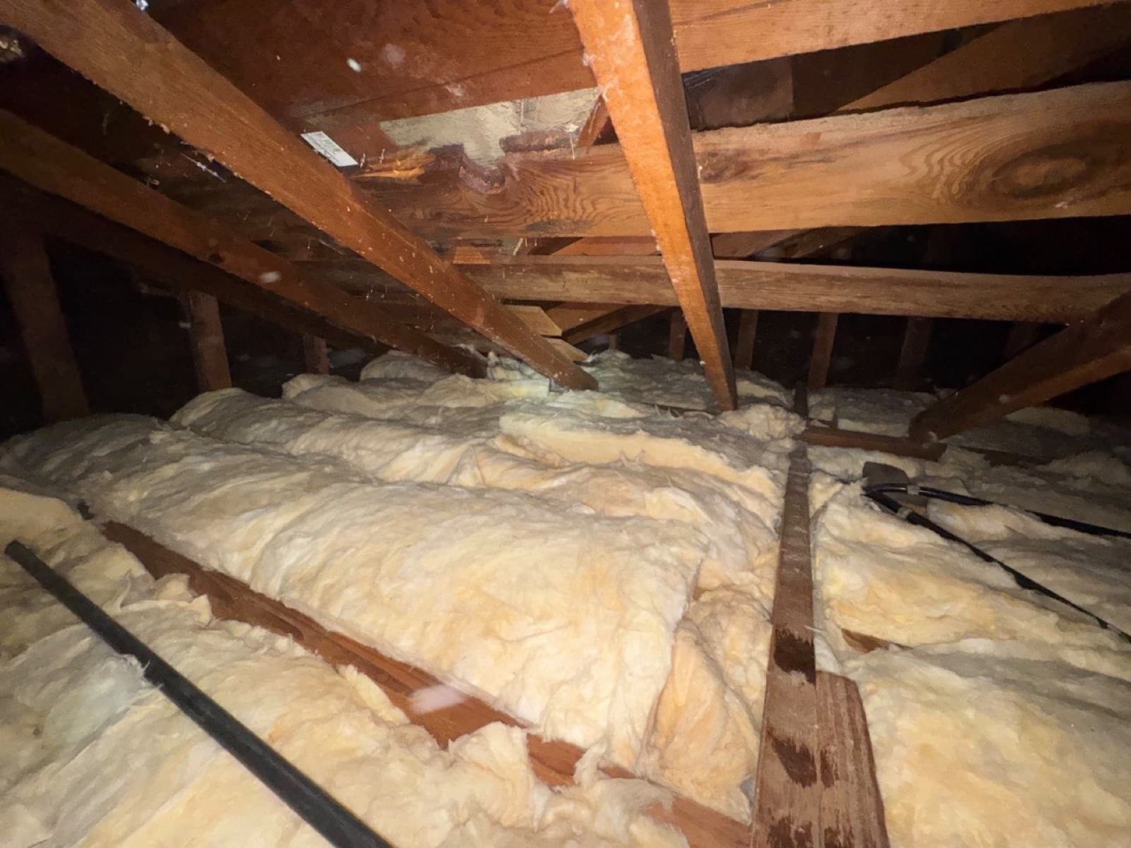 Burbank attic with the new insulation going in