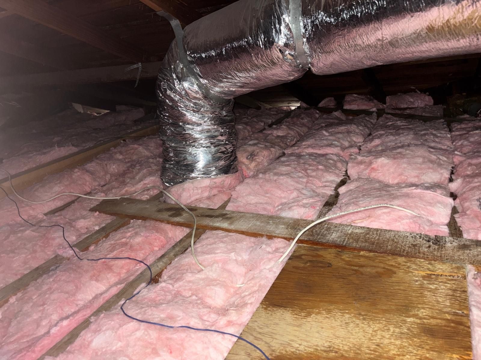 Early stage of the Lawndale attic job — clearing out