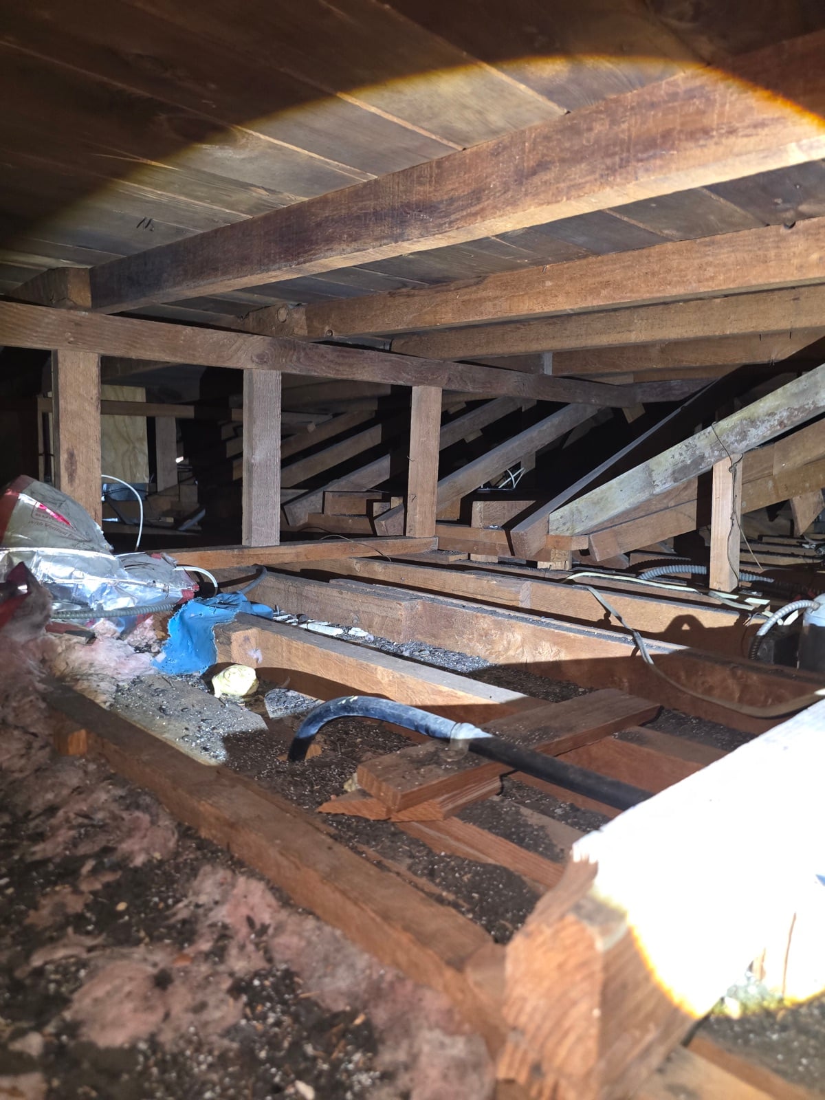 Los Angeles attic before work began, showing the condition the crew found