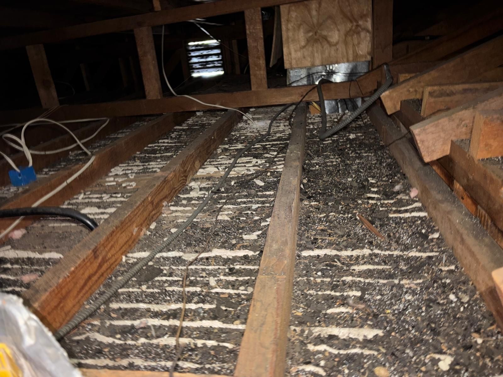 Early stage of the Los Angeles attic job — clearing out