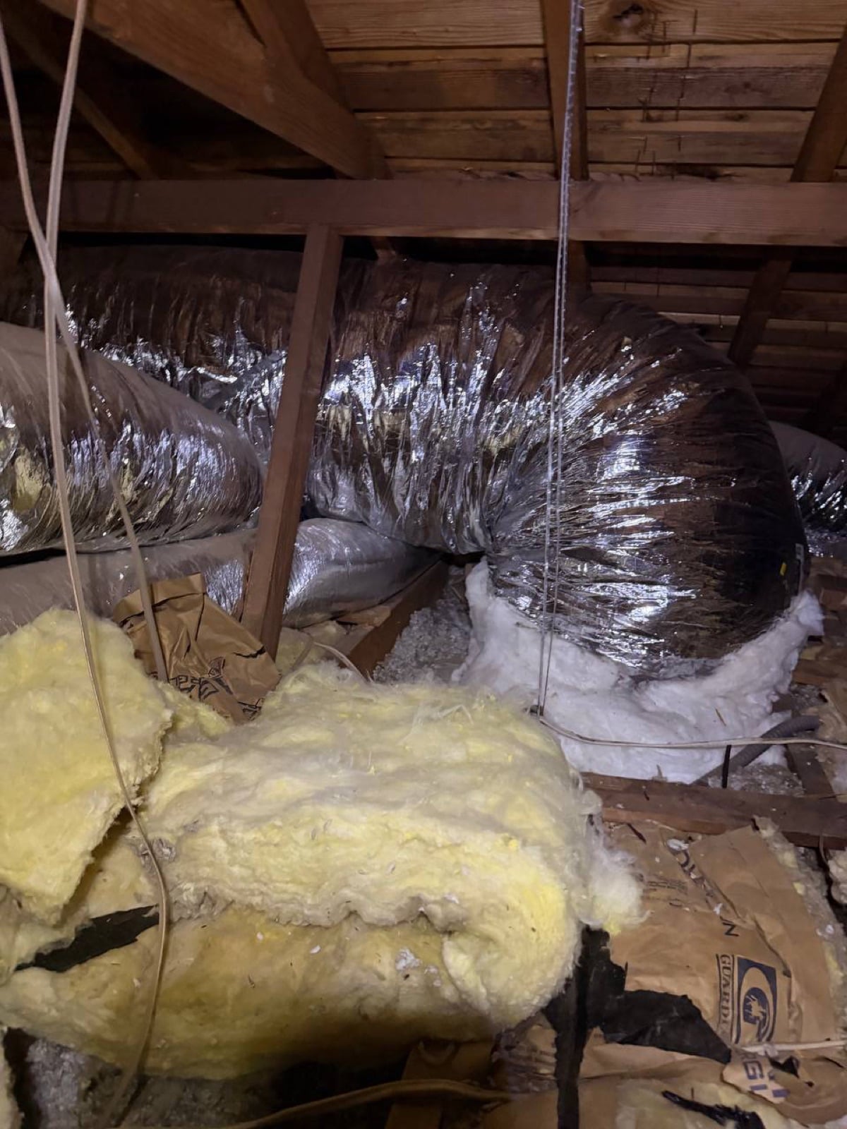 Los Angeles attic before work began, showing the condition the crew found