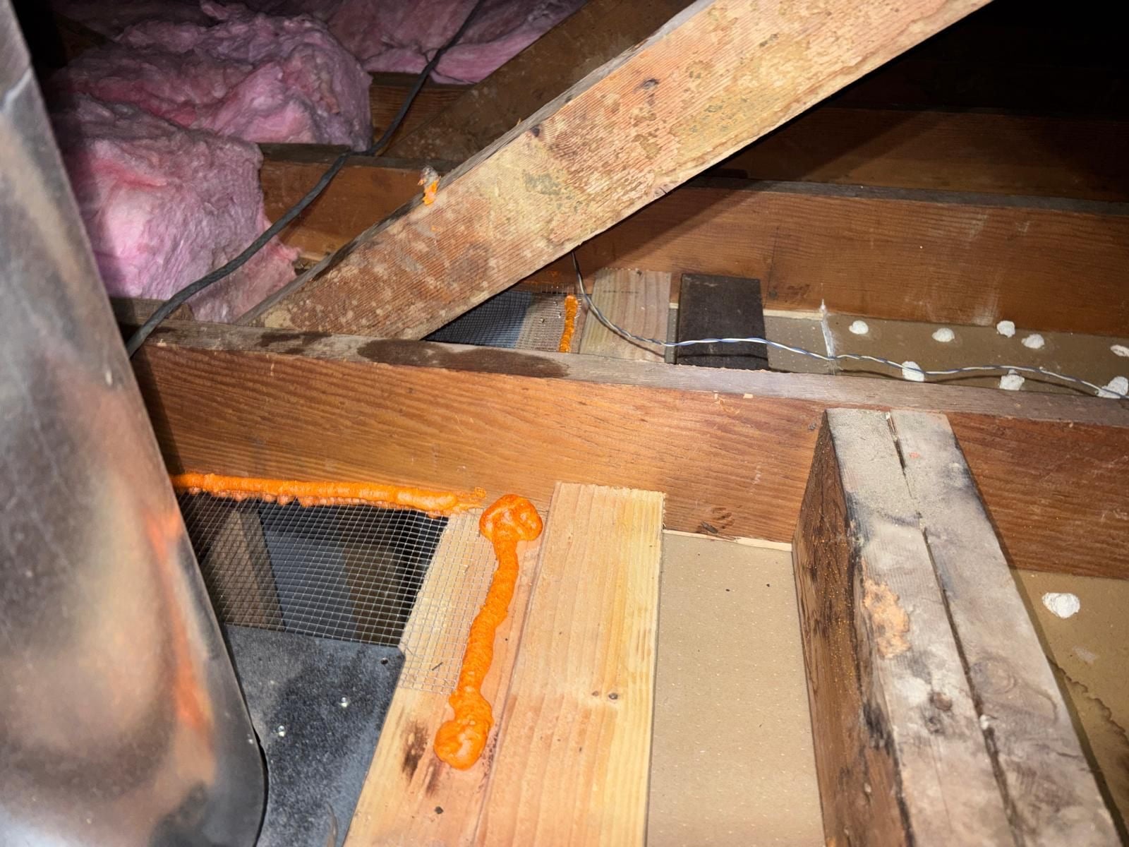 Los Angeles attic with the new insulation going in