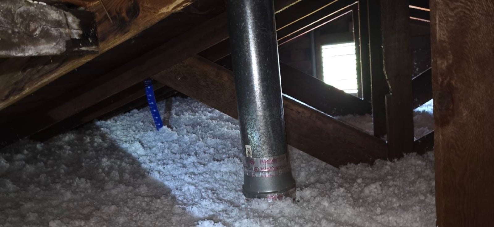 Martinez attic with the new insulation going in