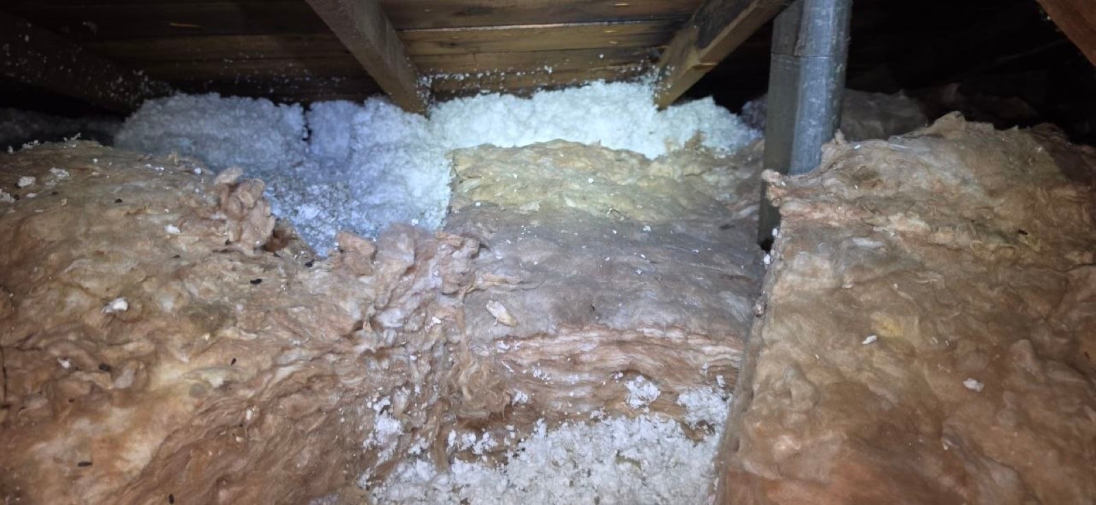 Martinez attic with the new insulation going in