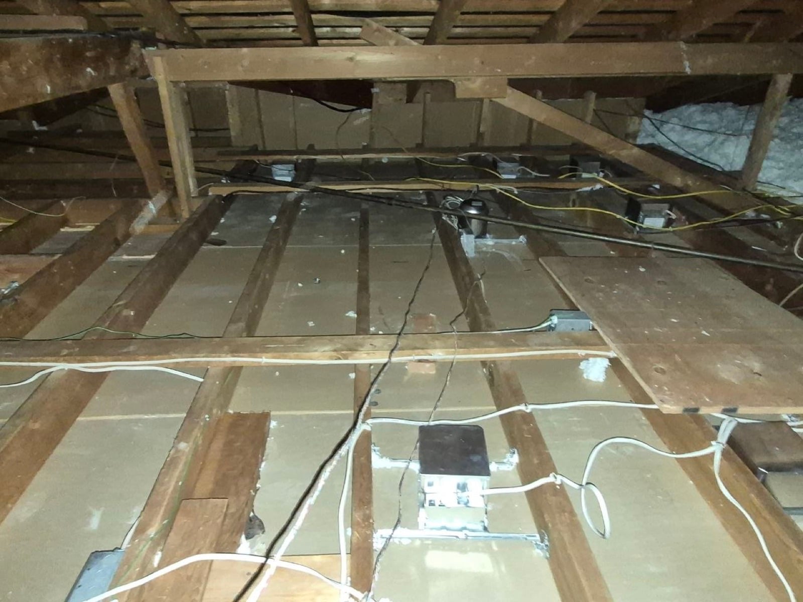 Early stage of the San Jose attic job — clearing out