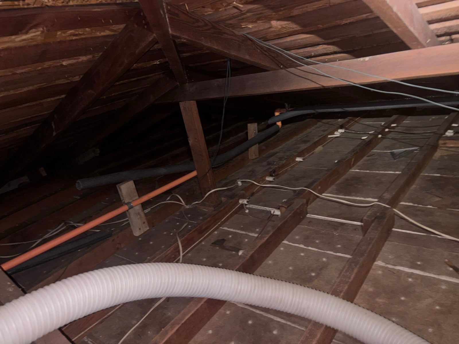 Alhambra attic cleared back to the deck before the new insulation went in