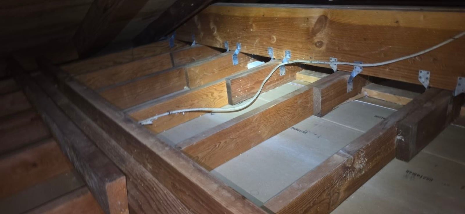 Early stage of the Novato attic and crawl space job — clearing out