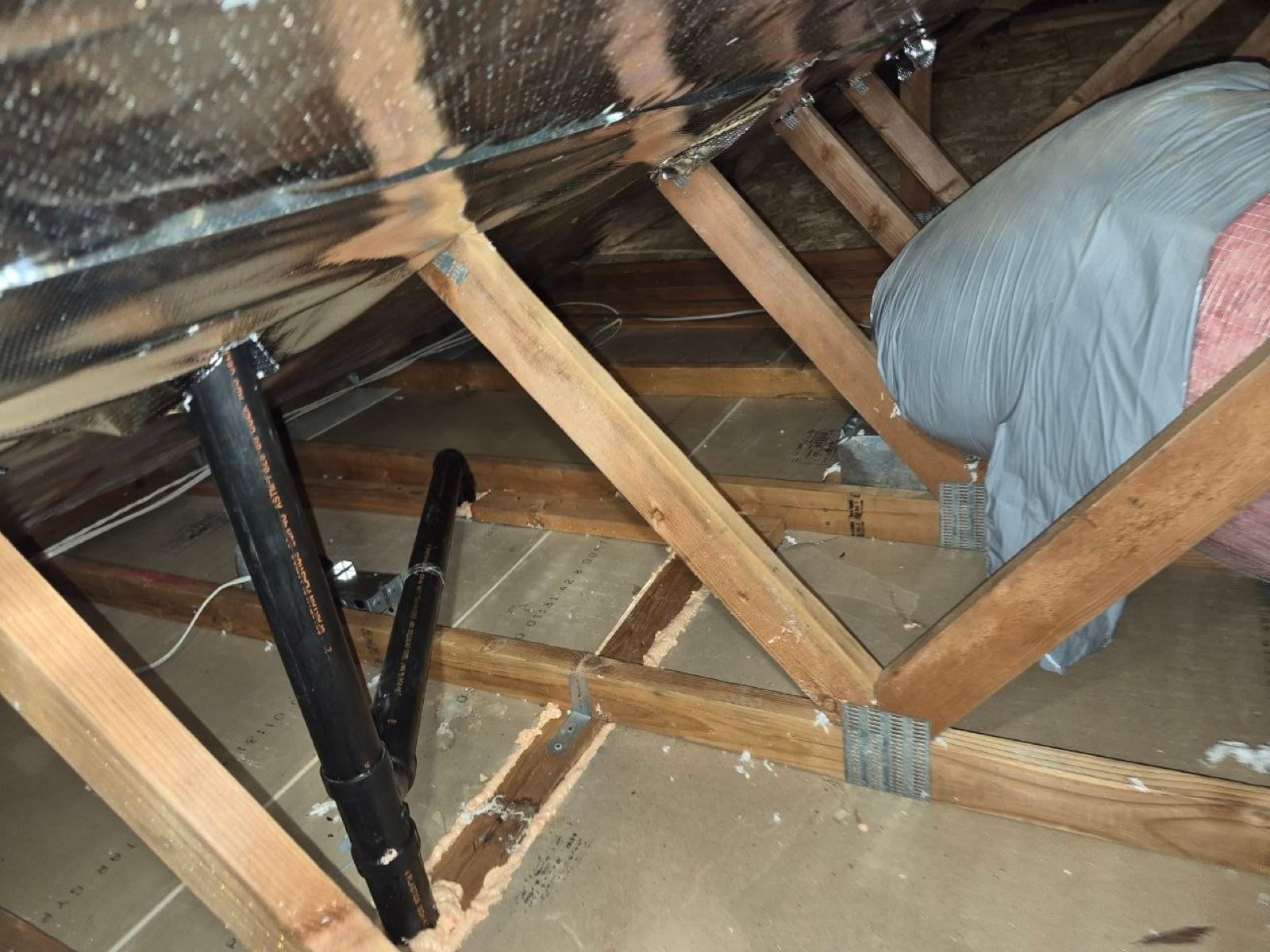 Brentwood attic with the new insulation going in