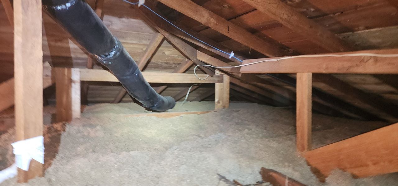 Another area of old insulation in the Berkeley attic before work