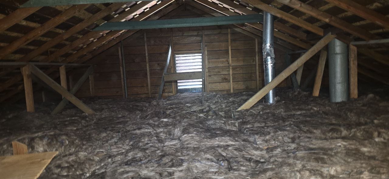 Another area of old insulation in the Berkeley attic before work