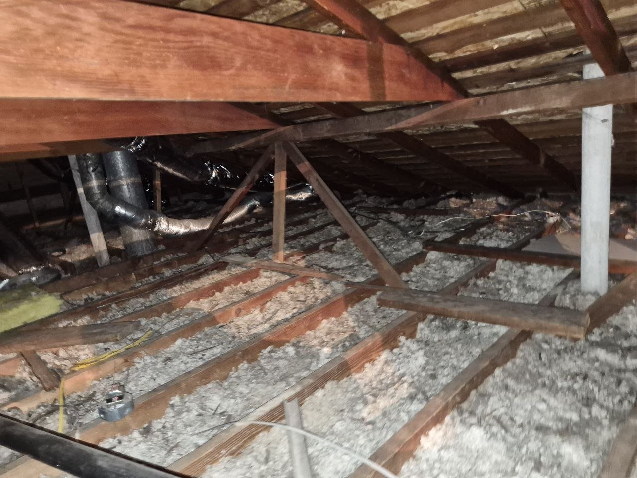 Concord attic before work, old insulation