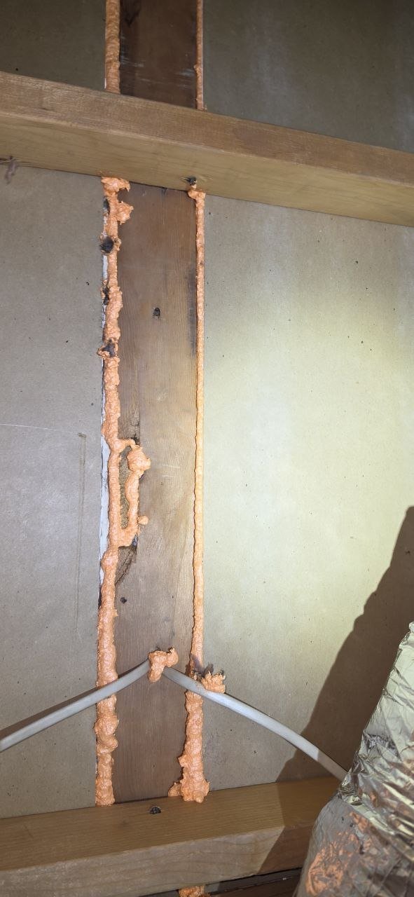 Polyurethane foam air sealing along attic framing in Concord
