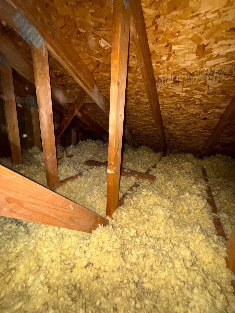 Another area of old insulation in the Danville attic before work