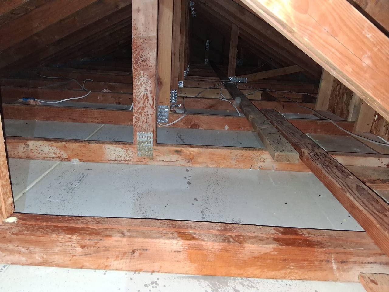 Danville attic after removal, joists and deck cleaned