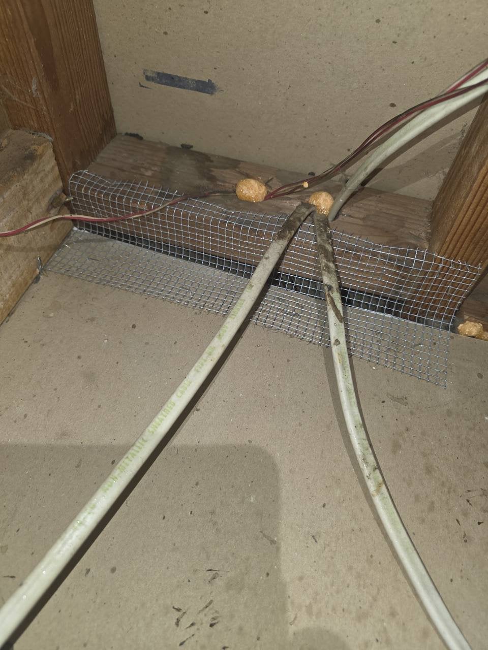 Wire mesh rodent proofing at an attic edge in Fairfield