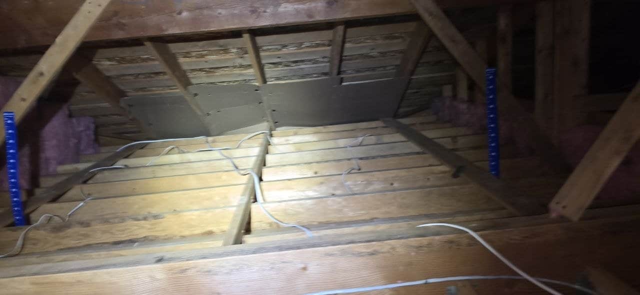 Fremont attic after removal, joists and deck cleaned