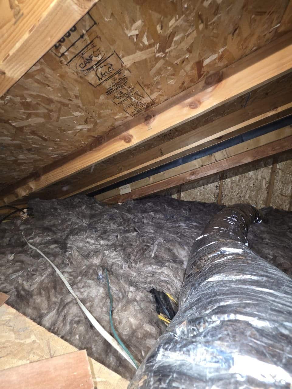 New insulation laid around ducts in a Fremont attic