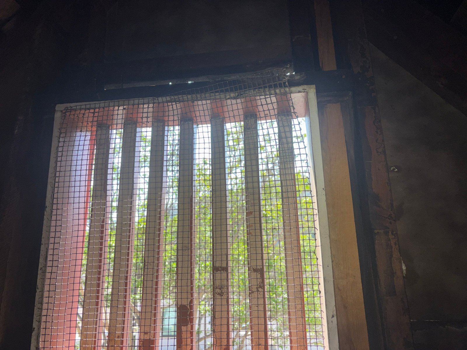 Attic vent screened with wire mesh in Glendale