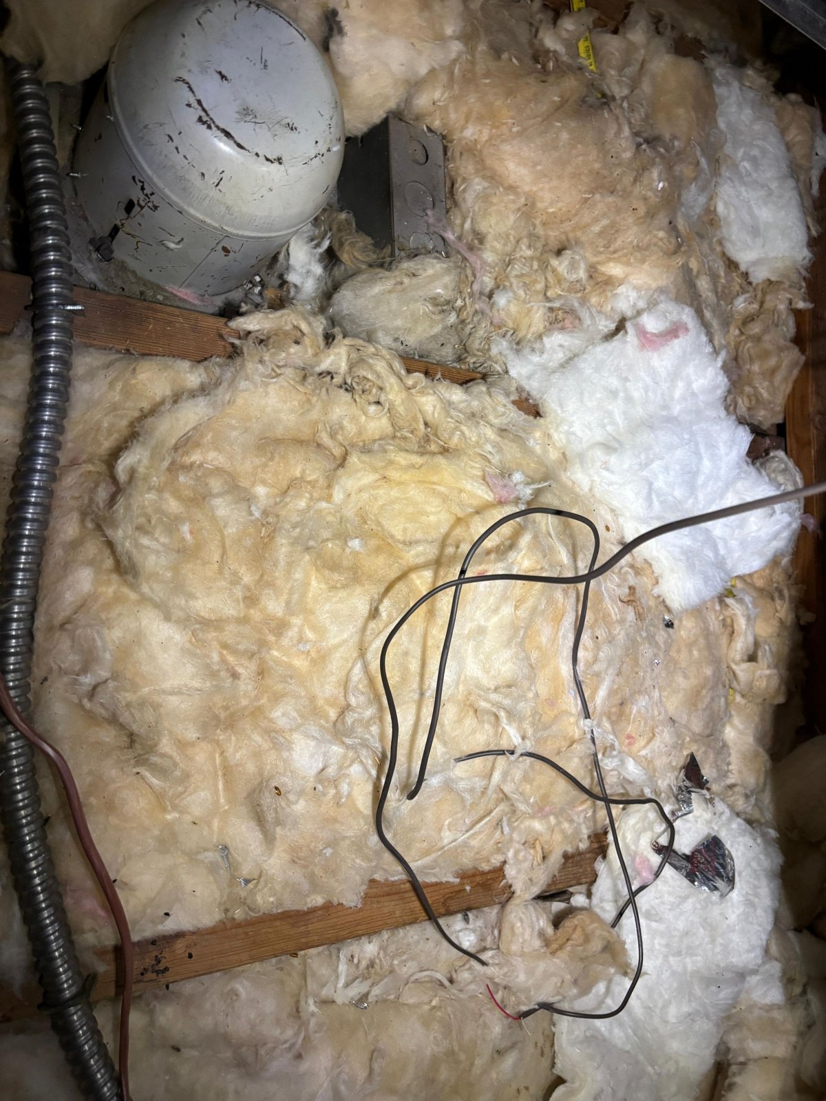Another area of old insulation in the Glendale attic before work