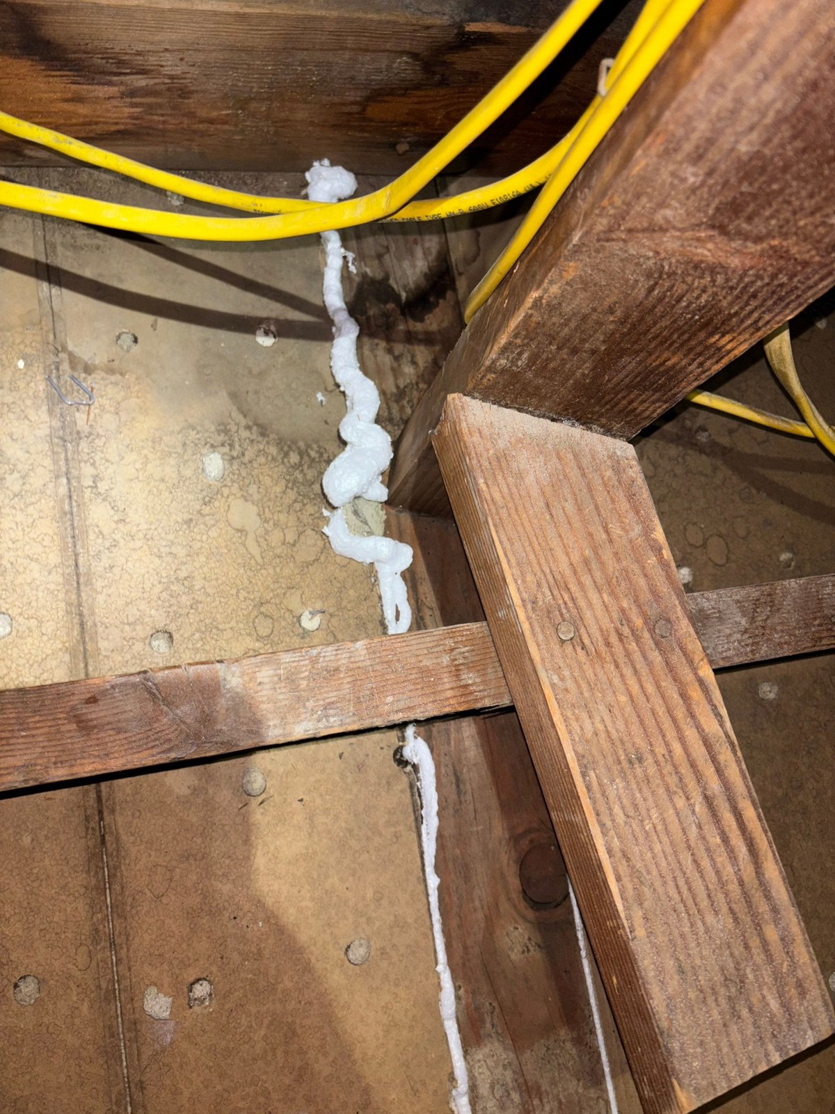 Polyurethane foam air sealing along attic framing in Glendale