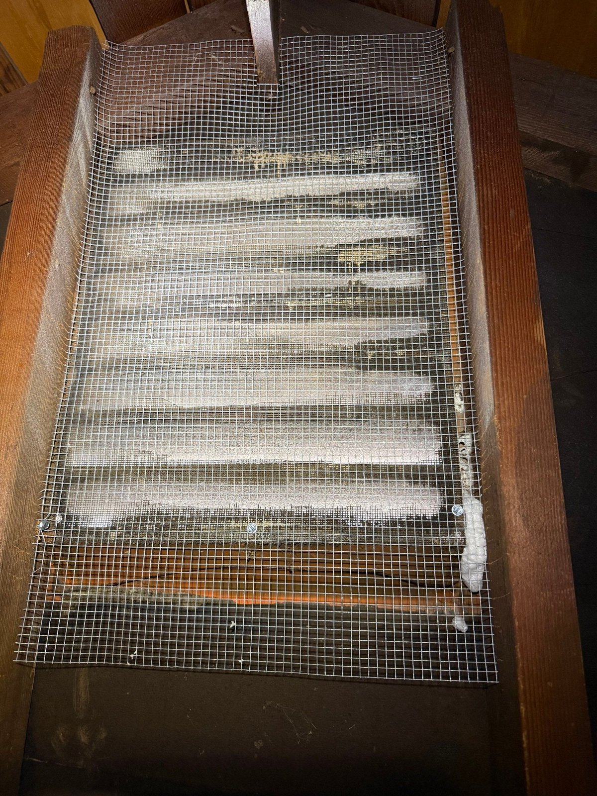 Attic vent screened with wire mesh in Glendale