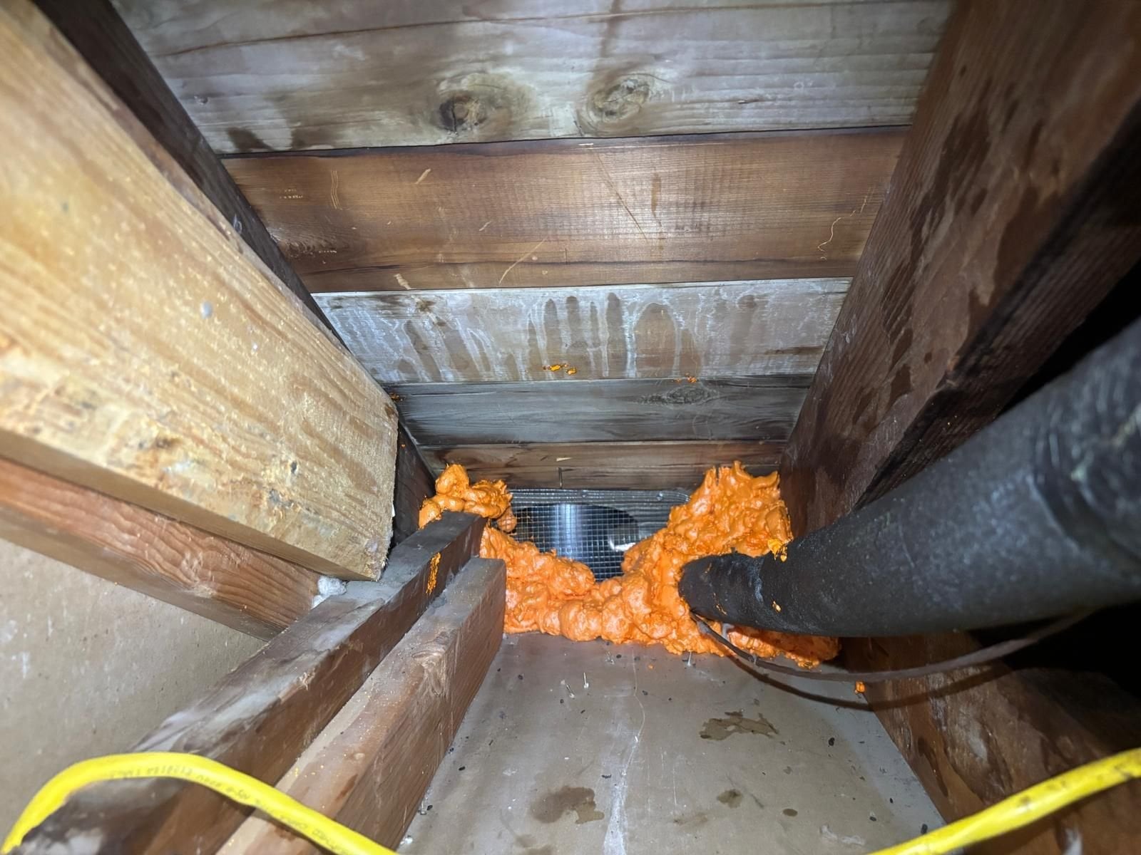Foam air sealing around an attic penetration in Glendora