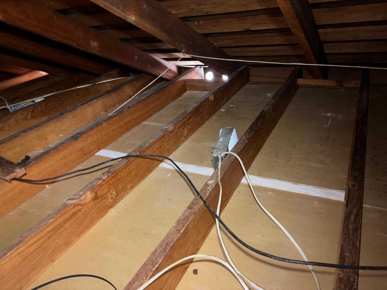 Hacienda Heights attic after removal, joists and deck cleaned