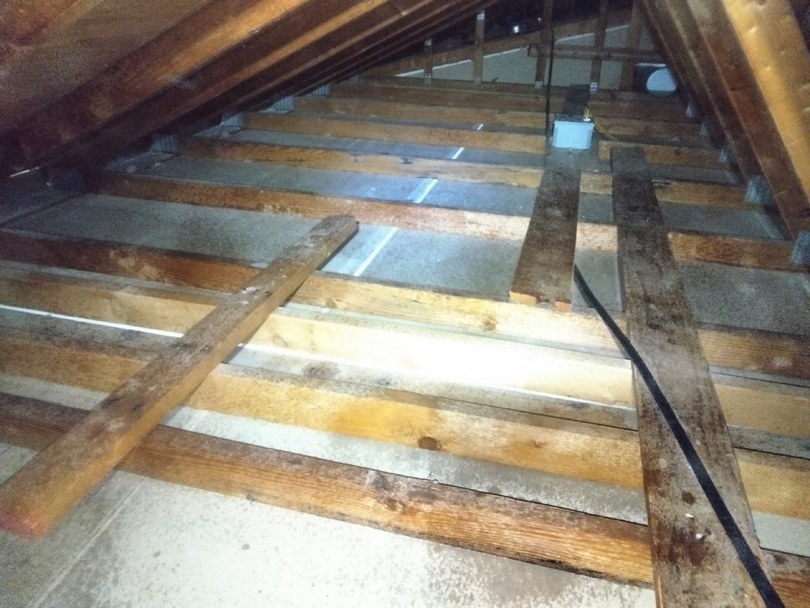 Early stage of the Calabasas attic job — clearing out